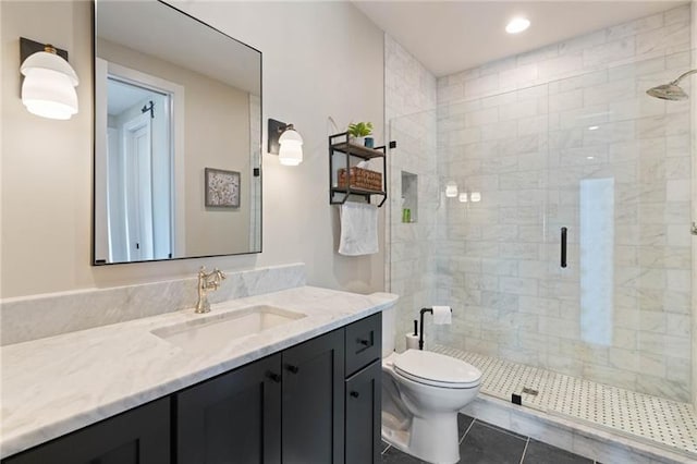 full bath featuring a shower stall, toilet, recessed lighting, tile patterned floors, and vanity