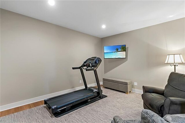 exercise area featuring hardwood / wood-style floors