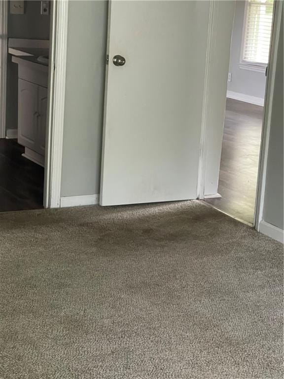 unfurnished room with carpet