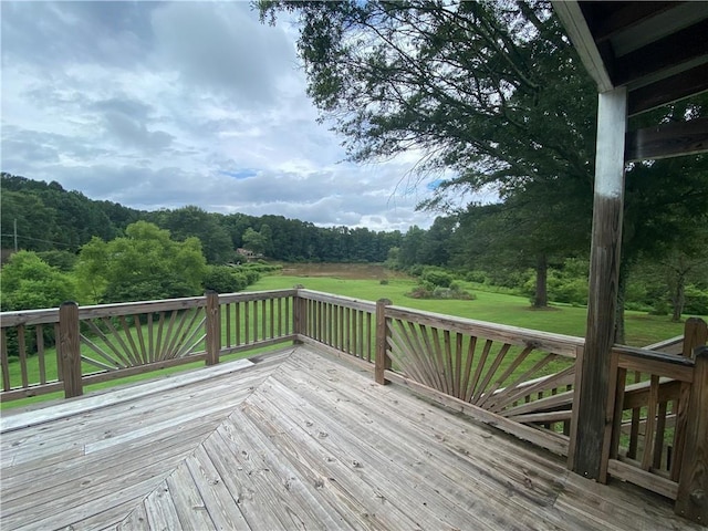 deck featuring a yard