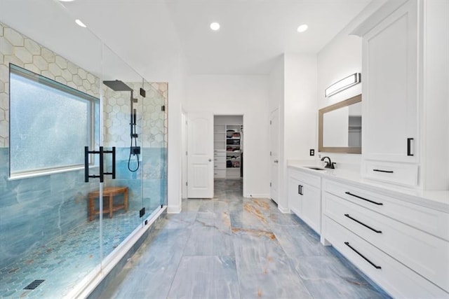 bathroom featuring vanity and walk in shower