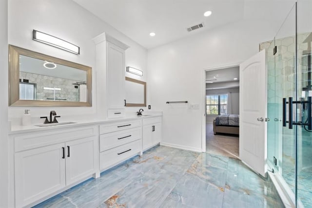 bathroom with vanity and walk in shower