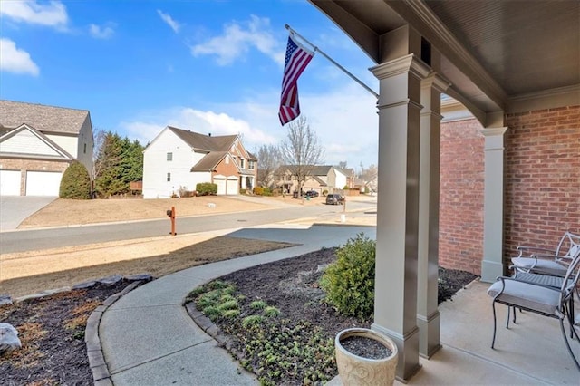 view of yard featuring a residential view