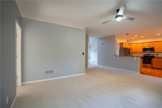 unfurnished living room featuring crown molding, ceiling fan, light carpet, and visible vents