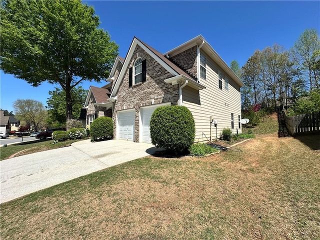view of side of property featuring stone siding, an attached garage, a lawn, and driveway