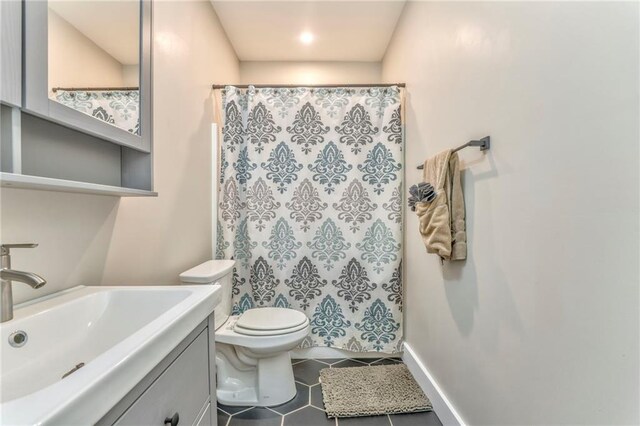 empty room with light colored carpet and ceiling fan