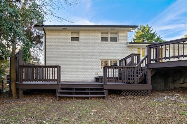 rear view of property with a deck