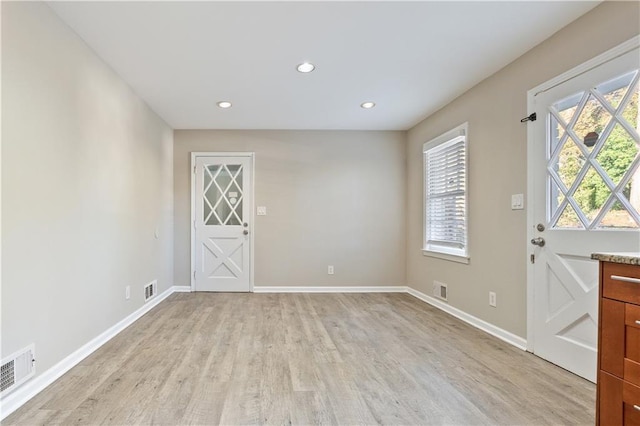 entryway with light wood-type flooring