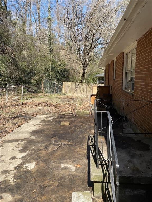 view of patio with fence