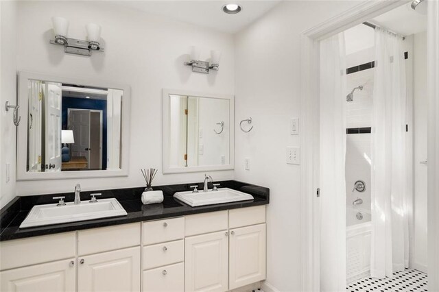 1928 Main St NW, Atlanta, GA 30318 - bathroom featuring shower / bath combination with curtain, double vanity, and recessed lighting
