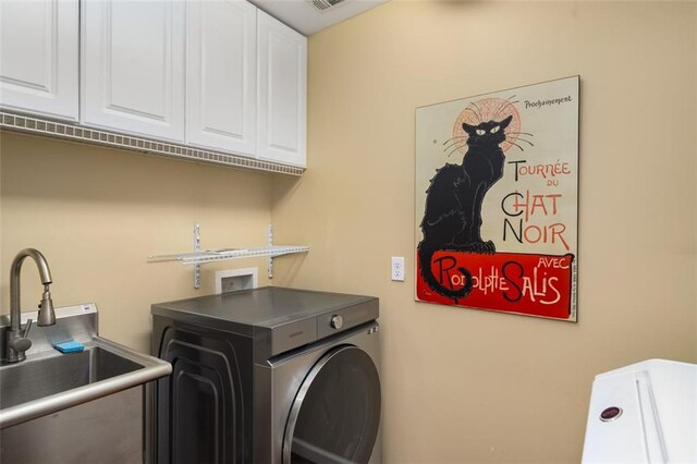 1928 Main St NW, Atlanta, GA 30318 - laundry room featuring cabinet space and separate washer and dryer