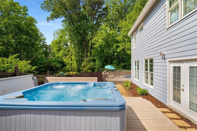 1928 Main St NW, Atlanta, GA 30318 - view of swimming pool featuring a deck, a hot tub, and french doors