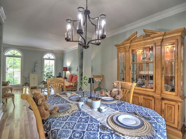 5105 Tynewick Trce NE, Roswell, GA 30075 - dining area featuring a chandelier, crown molding, and wood finished floors