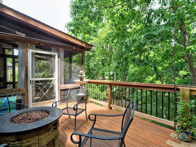 5105 Tynewick Trce NE, Roswell, GA 30075 - wooden deck with a sunroom and a fire pit