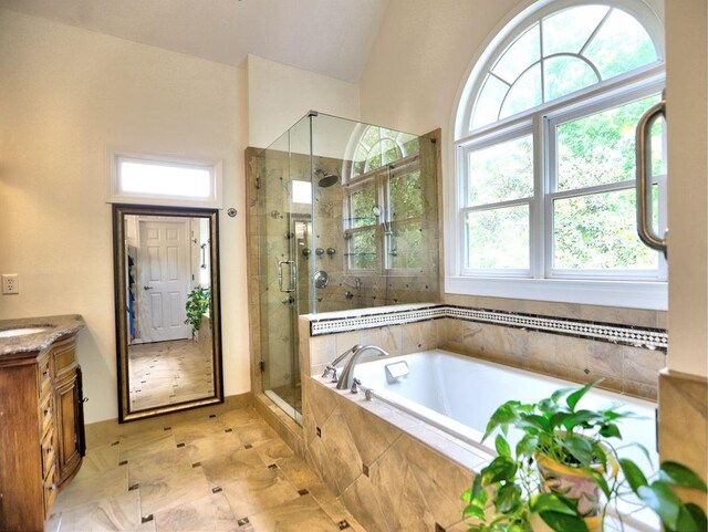 5105 Tynewick Trce NE, Roswell, GA 30075 - full bathroom featuring healthy amount of natural light, a shower stall, a garden tub, and vanity