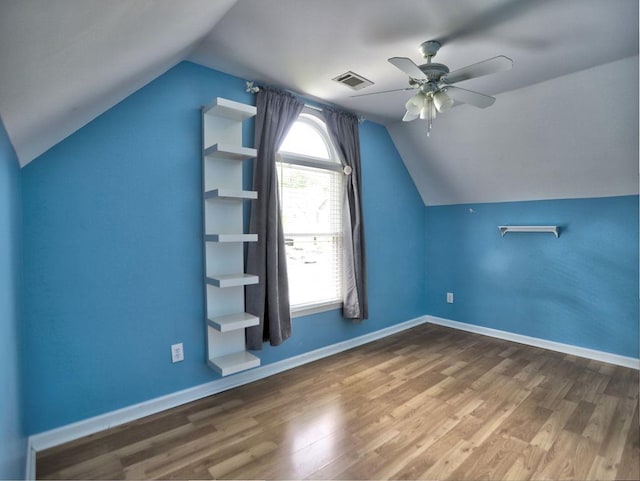 5105 Tynewick Trce NE, Roswell, GA 30075 - additional living space with lofted ceiling, wood finished floors, ceiling fan, and baseboards