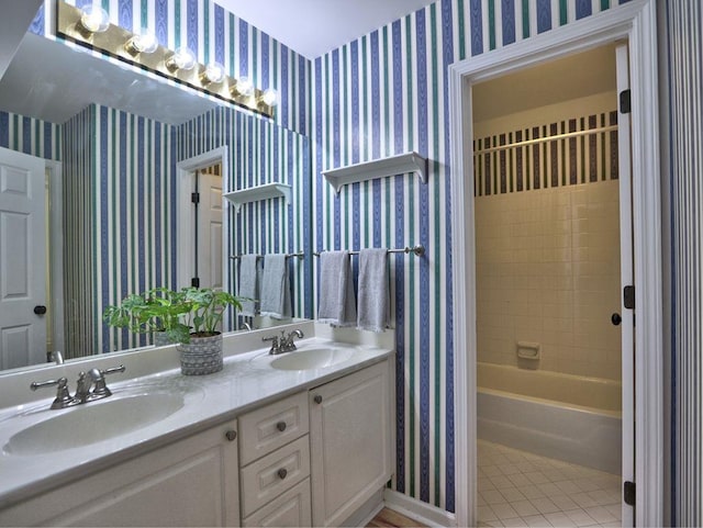 5105 Tynewick Trce NE, Roswell, GA 30075 - full bathroom with tile patterned floors, wallpapered walls, baseboards, and double vanity