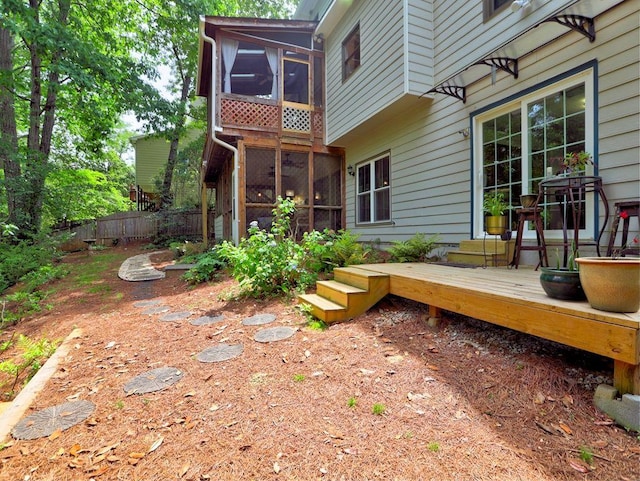 5105 Tynewick Trce NE, Roswell, GA 30075 - rear view of house featuring a sunroom, a deck, and fence