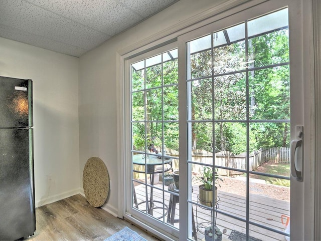 5105 Tynewick Trce NE, Roswell, GA 30075 - entryway featuring wood finished floors, baseboards, and a paneled ceiling
