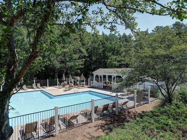 5105 Tynewick Trce NE, Roswell, GA 30075 - community pool with fence and a patio area