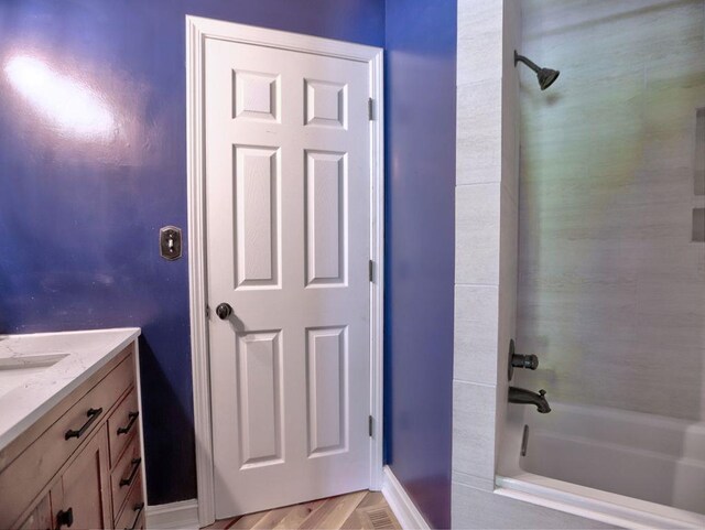 5105 Tynewick Trce NE, Roswell, GA 30075 - full bath featuring vanity, baseboards, and shower / bath combination