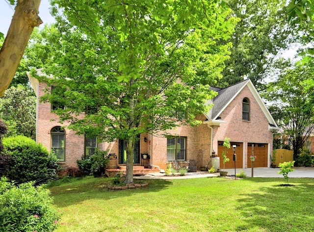 5105 Tynewick Trce NE, Roswell, GA 30075 - view of front of house with brick siding, a garage, concrete driveway, and a front yard