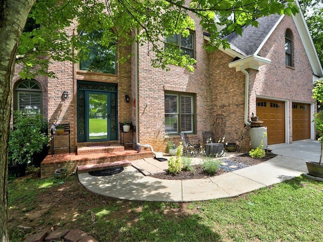 5105 Tynewick Trce NE, Roswell, GA 30075 - view of front of house with brick siding, a garage, roof with shingles, and driveway