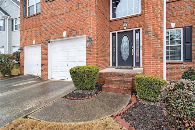 property entrance with a garage