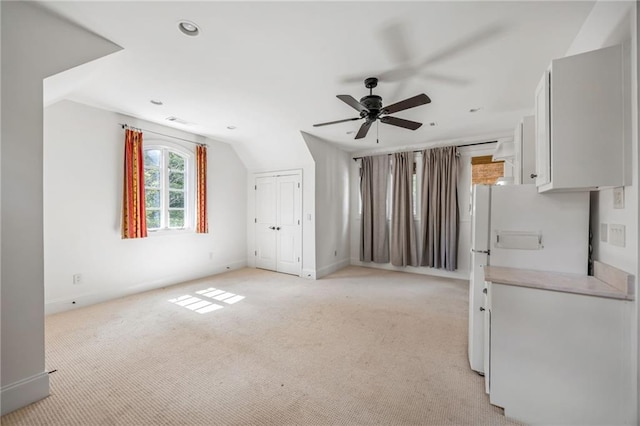 bonus room with ceiling fan, light colored carpet, baseboards, vaulted ceiling, and recessed lighting