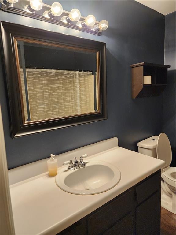 1751 Bridle Ln, Macon, GA 31220 - full bathroom with toilet and vanity