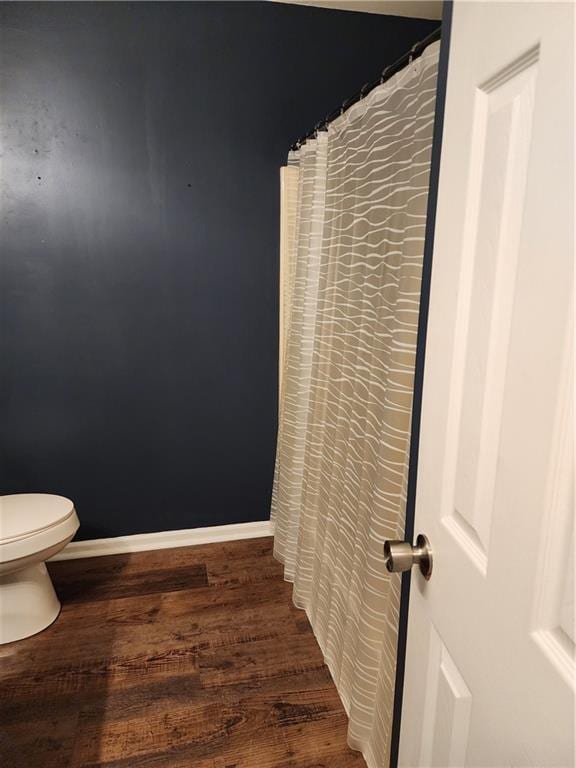 1751 Bridle Ln, Macon, GA 31220 - bathroom featuring toilet and wood finished floors