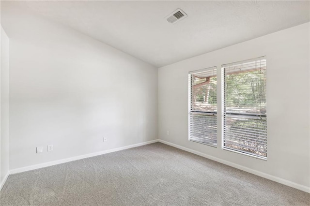 unfurnished room with carpet