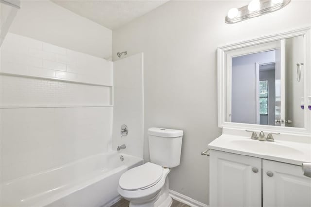 full bathroom featuring vanity, toilet, and bathtub / shower combination