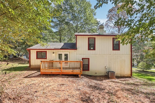 rear view of house featuring a deck