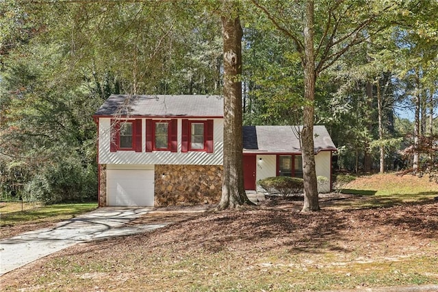 split level home with a garage