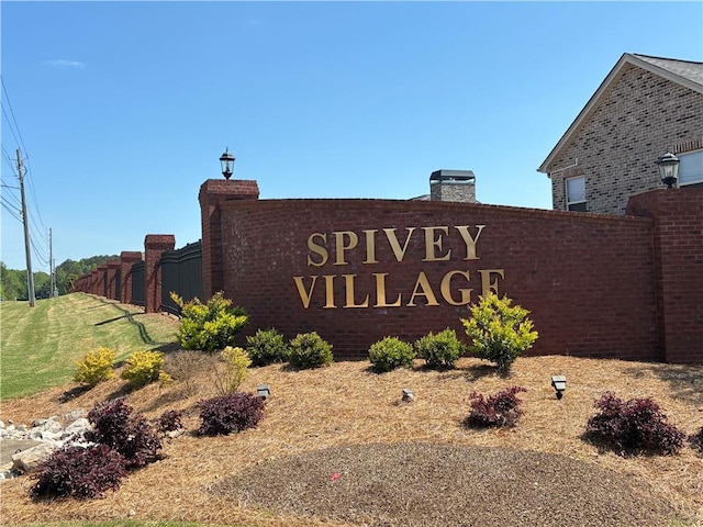 view of community sign