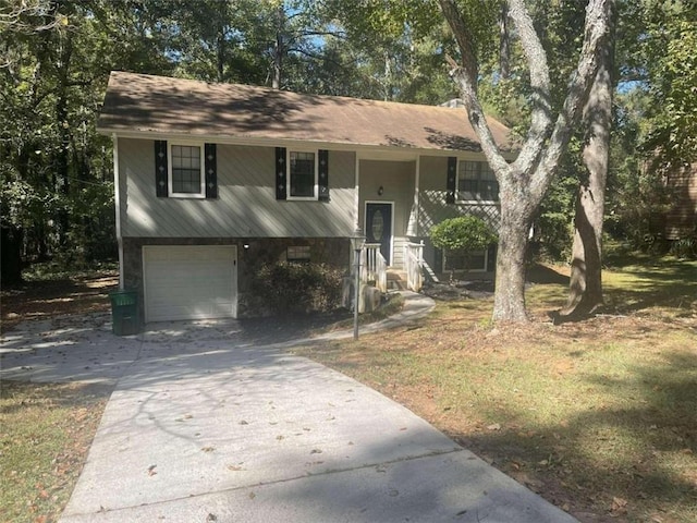 raised ranch featuring a garage