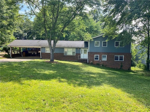 split level home with a carport and a front yard