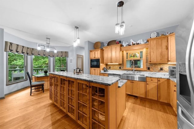 1731 Apple Pie Ridge Rd, Alto, GA 30510 - kitchen featuring black microwave, a sink, an island with sink, light wood finished floors, and a chandelier
