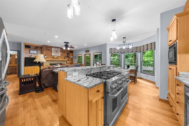 1731 Apple Pie Ridge Rd, Alto, GA 30510 - kitchen with stainless steel appliances, light wood-type flooring, recessed lighting, light stone counters, and hanging light fixtures