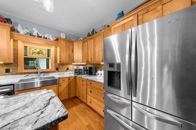 1731 Apple Pie Ridge Rd, Alto, GA 30510 - kitchen featuring stainless steel fridge, a sink, light wood finished floors, backsplash, and lofted ceiling