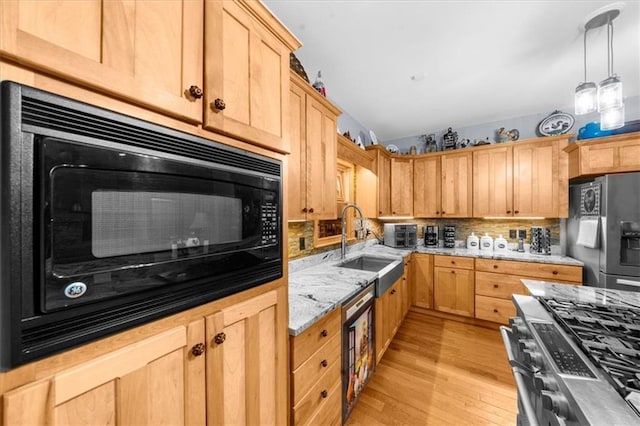 1731 Apple Pie Ridge Rd, Alto, GA 30510 - kitchen featuring stainless steel appliances, light wood-style floors, tasteful backsplash, light stone countertops, and light brown cabinets