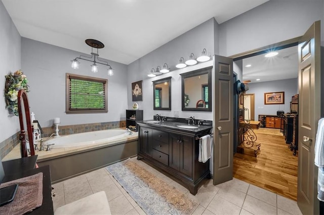 1731 Apple Pie Ridge Rd, Alto, GA 30510 - bathroom featuring tile patterned floors, a bath, double vanity, and recessed lighting