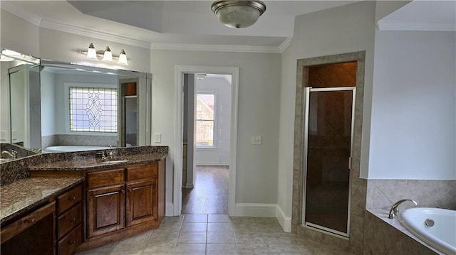 full bath with a garden tub, ornamental molding, a shower stall, tile patterned flooring, and baseboards