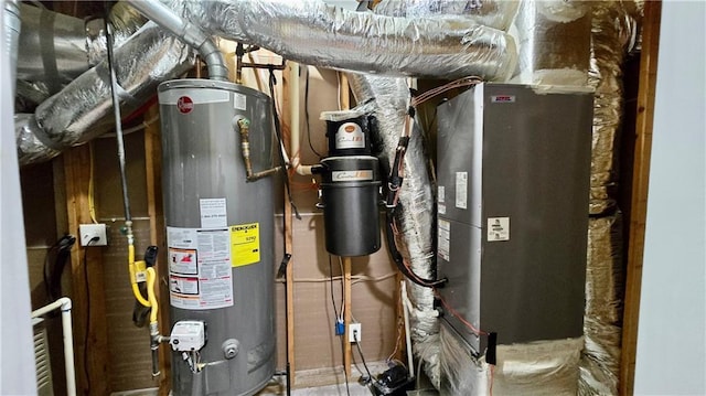 utility room featuring water heater