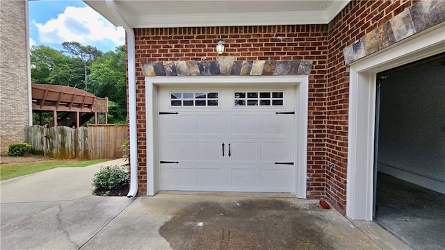 garage featuring driveway