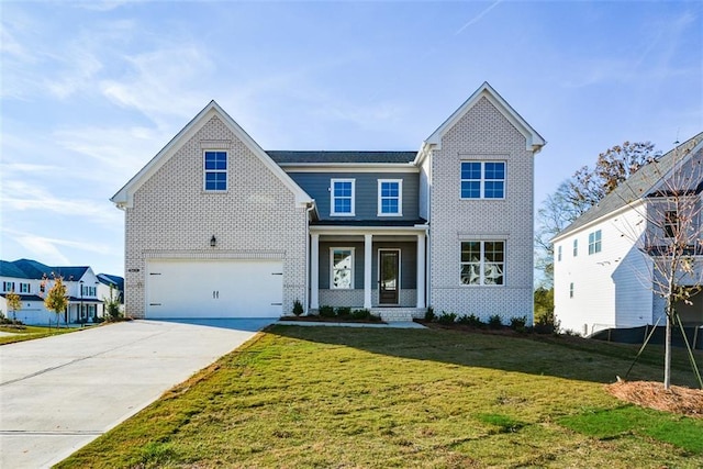 view of front of house featuring a front lawn, covered porch, and a garage