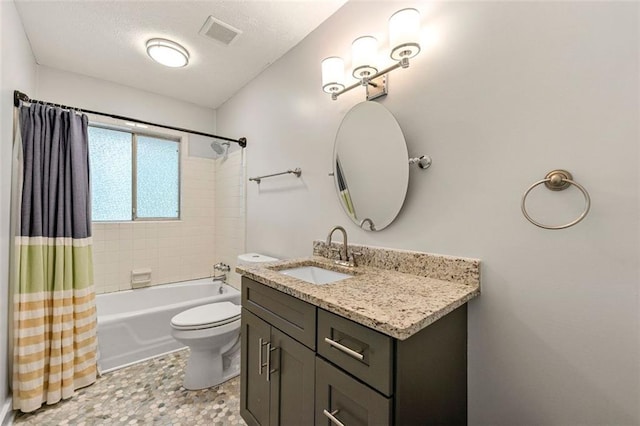 full bath with toilet, visible vents, shower / tub combo with curtain, and vanity