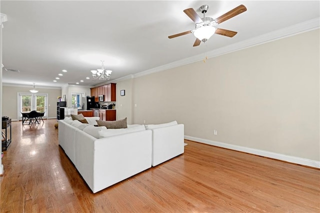 3642 Princeton Ave, Atlanta, GA 30337 - living room with ornamental molding, a chandelier, light wood finished floors, a ceiling fan, and recessed lighting