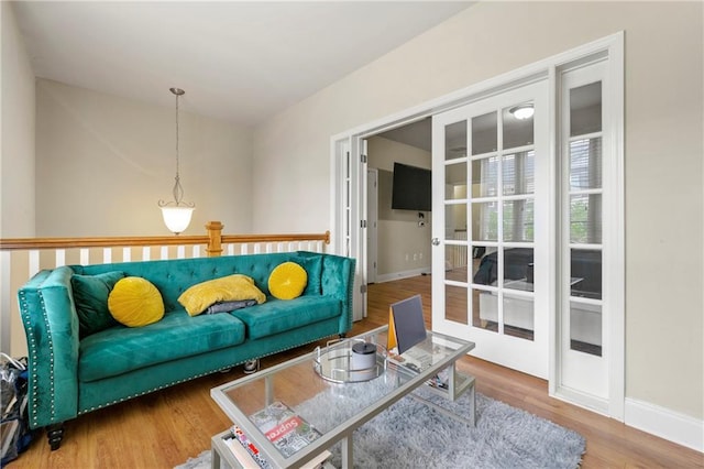 3642 Princeton Ave, Atlanta, GA 30337 - living room featuring wood finished floors and baseboards